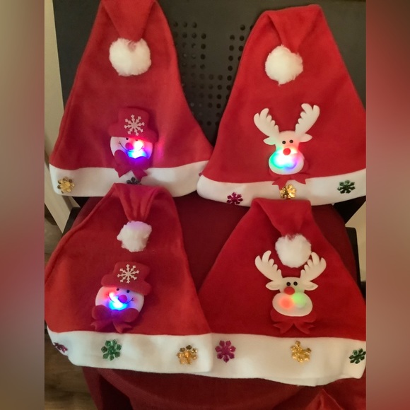 4 very soft stretchy cotton like lighted Santa hats, 2 Snowmen 2 Reindeer. - Picture 1 of 2